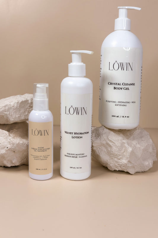 Three Löwin skincare products on a beige background