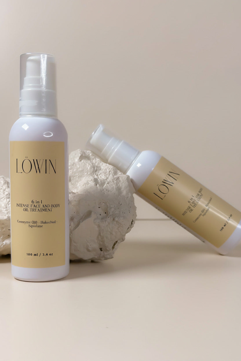 Two bottles of Intense face and body oil Löwin treatment skincare products 