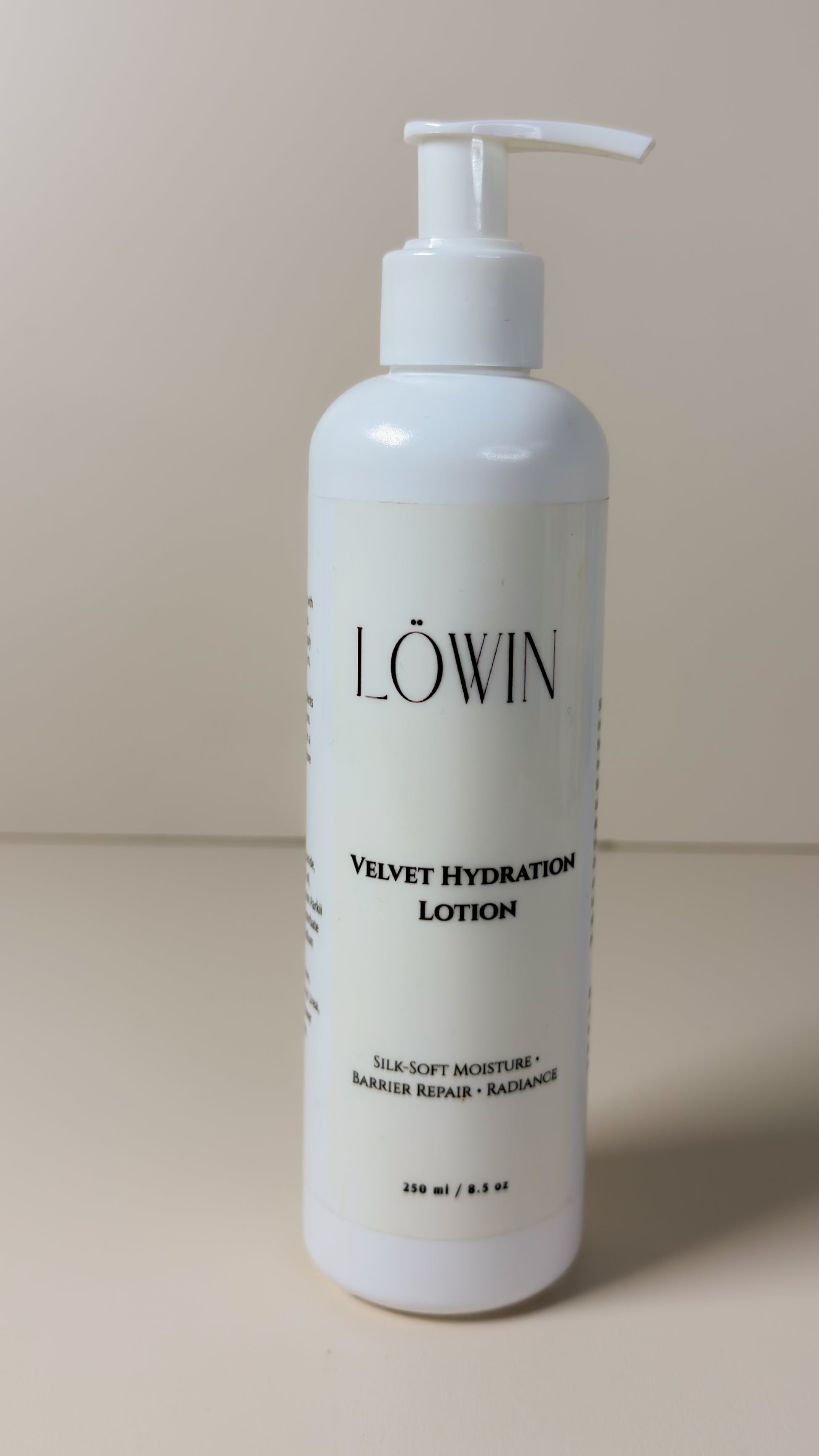 Löwin hydrating body lotion on a beige background